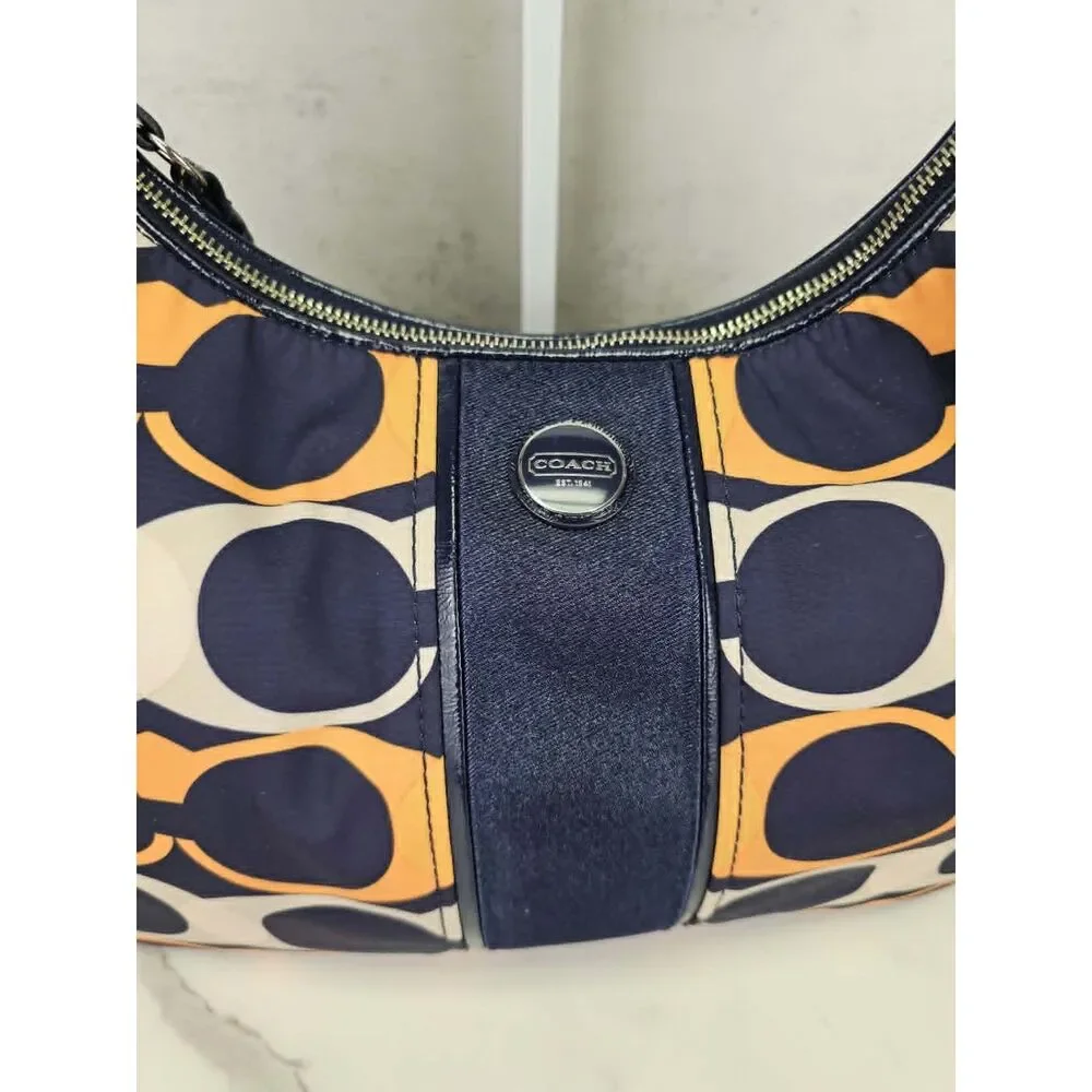Coach Poppy Linear Signature 